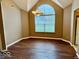 Bright dining room featuring hardwood floors and a chandelier at 5129 W Preakness Ct, Muncie, IN 47304