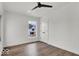 Bedroom featuring wood flooring and an accent door at 514 Spruce St, Indianapolis, IN 46203