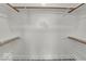 Spacious closet with well-designed shelving and hanging rods provides optimal storage, enhanced by modern tile at 514 Spruce St, Indianapolis, IN 46203
