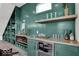 Entertainment area with a custom bar, stylish decor, and sleek built-in shelving at 514 Spruce St, Indianapolis, IN 46203