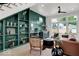 Modern living room with built-in bookshelves, a wet bar, and an open, airy feel at 514 Spruce St, Indianapolis, IN 46203
