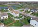 An aerial view of home featuring a spacious backyard, patio, manicured lawn and shed at 5209 Twin Bridge Blvd, Indianapolis, IN 46239