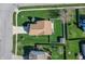 An overhead view of a home showcasing it's large yard, shed and landscaping at 5209 Twin Bridge Blvd, Indianapolis, IN 46239