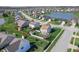 An aerial view of home featuring lush green yard and pond at 5209 Twin Bridge Blvd, Indianapolis, IN 46239