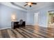 Spacious bedroom with a ceiling fan and ample natural light, perfect for relaxing or working at 5209 Twin Bridge Blvd, Indianapolis, IN 46239
