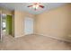 Bedroom featuring carpet, a ceiling fan and closet at 5209 Twin Bridge Blvd, Indianapolis, IN 46239