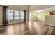 Bright and airy living room featuring vaulted ceiling and hardwood floors at 5209 Twin Bridge Blvd, Indianapolis, IN 46239