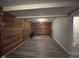 This rec room has wood-look floors and accent walls, plus ample space for entertaining friends and Gathering at 5240 Regency Dr, Columbus, IN 47203