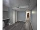 This flex room boasts wood-look flooring, built-in shelving, a drop-down desk, and a walk-in closet at 5240 Regency Dr, Columbus, IN 47203