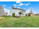 The large backyard offers plenty of space for outdoor activities at 5247 Crowley Pkwy, Whitestown, IN 46075