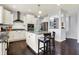 Well-equipped kitchen with stainless steel appliances, granite counters, and an island with seating at 5247 Crowley Pkwy, Whitestown, IN 46075