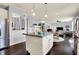 Spacious kitchen featuring a granite-topped island, stainless steel appliances, and open layout at 5247 Crowley Pkwy, Whitestown, IN 46075