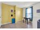 Bright laundry area features a window and ample space for folding laundry at 5247 Crowley Pkwy, Whitestown, IN 46075