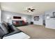 Comfortable living room with plush sofas, ample seating, and neutral carpeting at 5247 Crowley Pkwy, Whitestown, IN 46075