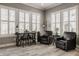 Cozy breakfast nook featuring ample natural light, comfortable seating, and a peaceful ambiance, perfect for relaxation at 528 Dylan Dr, Carmel, IN 46032