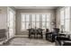 Bright breakfast nook with large windows, comfortable seating, and a view of the outdoors, ideal for morning coffee at 528 Dylan Dr, Carmel, IN 46032
