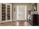 Inviting foyer with a decorative table and hardwood flooring at 528 Dylan Dr, Carmel, IN 46032