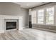Living room with fireplace and natural light at 528 Dylan Dr, Carmel, IN 46032