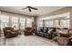 Spacious living room with a large window and neutral decor and hardwood flooring at 528 Dylan Dr, Carmel, IN 46032