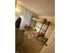 Bright bedroom featuring a lofted twin bed over a small play area with toys at 6225 Roberts Creek Ln, Indianapolis, IN 46221
