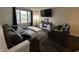 Cozy living room with modern decor, comfortable seating, and a large window for ample light at 6225 Roberts Creek Ln, Indianapolis, IN 46221