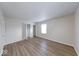 Spacious bedroom with a large closet, window for natural light and wood-look floors at 6501 Meadowlark Dr, Indianapolis, IN 46226