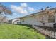 A well-maintained backyard with lush green grass and partial fencing at 6742 S New Jersey St, Indianapolis, IN 46227