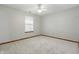 Neutral bedroom with bright natural light and neutral-colored carpet at 6742 S New Jersey St, Indianapolis, IN 46227