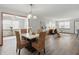 Open-concept design with a dining area flowing into a living room, creating an inviting atmosphere at 6742 S New Jersey St, Indianapolis, IN 46227