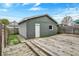 Backyard featuring an inviting deck with a detached garage at 715 Cottage Ave, Indianapolis, IN 46203