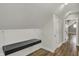 Bonus room featuring a floating black desk and shiplap wall at 715 Cottage Ave, Indianapolis, IN 46203