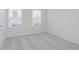 Bright bedroom featuring carpet, and two windows at 7342 Shroyer Way, Noblesville, IN 46062