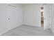 Clean bedroom featuring carpet, closet, and an open bathroom doorway at 7342 Shroyer Way, Noblesville, IN 46062