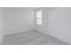 Neutral bedroom featuring carpet, a window with blinds, and a closet at 7342 Shroyer Way, Noblesville, IN 46062
