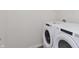 Modern laundry room featuring white appliances at 7342 Shroyer Way, Noblesville, IN 46062