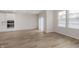 Living room area with stainless steel appliances and windows that provide natural light at 7342 Shroyer Way, Noblesville, IN 46062