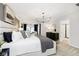 Beautiful main bedroom with elegant decor, an en-suite bathroom, and soft, plush carpeting at 7342 Shroyer Way, Noblesville, IN 46062