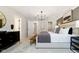 Bright main bedroom features a serene atmosphere, modern furnishings, and walk-in closet access at 7342 Shroyer Way, Noblesville, IN 46062