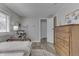 Bedroom featuring wood accents, neutral wall color, and natural light at 7668 Heather Dr, Nineveh, IN 46164