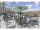 Outdoor deck with an umbrella, lounge furniture, and a beautiful lake view at 7668 Heather Dr, Nineveh, IN 46164