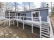 Stylish home featuring a deck, screened porch, and well-maintained yard at 7668 Heather Dr, Nineveh, IN 46164