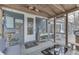 Covered porch with outdoor seating and view of the property at 7668 Heather Dr, Nineveh, IN 46164