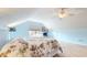 Inviting bedroom with carpet, ceiling fan, sloped ceiling, and large window providing natural light at 7971 Cool Hollow Pl, Indianapolis, IN 46237