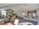 Relaxing community room features a bar, tables and chairs, offering a comfortable space for residents at 7971 Cool Hollow Pl, Indianapolis, IN 46237