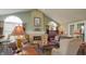 Community room offers a fireplace with comfortable seating and decor for a welcoming and relaxing environment at 7971 Cool Hollow Pl, Indianapolis, IN 46237