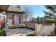View of the side of a home featuring stone foundation and red shutters at 7971 Cool Hollow Pl, Indianapolis, IN 46237