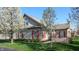 Charming single-story home with red shutters, well-maintained lawn, and blossoming trees at 7971 Cool Hollow Pl, Indianapolis, IN 46237