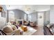Cozy living room with vaulted ceilings, fireplace, and abundant natural light at 7971 Cool Hollow Pl, Indianapolis, IN 46237