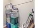 Storage area with plastic bins and ladder, providing organization and convenience at 7971 Cool Hollow Pl, Indianapolis, IN 46237