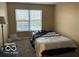 Inviting bedroom with neutral carpet and a window for natural light at 804 Seabreeze Dr, Avon, IN 46123